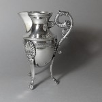 pot à lait en métal argenté de style empire vers 1900. hauteur 13 cm. 35€